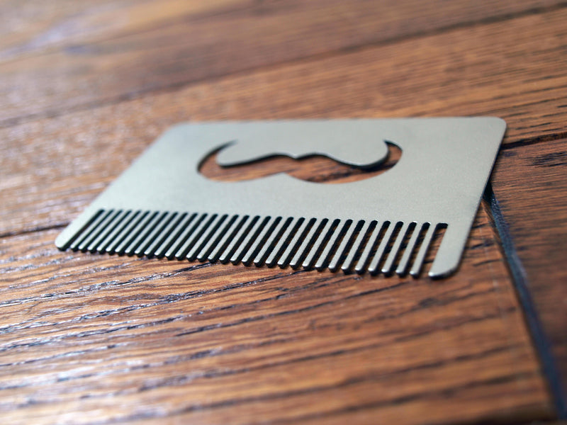 Load image into Gallery viewer, Titanium Mustache Comb from Calti, edc tool, tactical tool, edc, every day carry, titanium edc, tactical edc, beard comb, hipster comb
