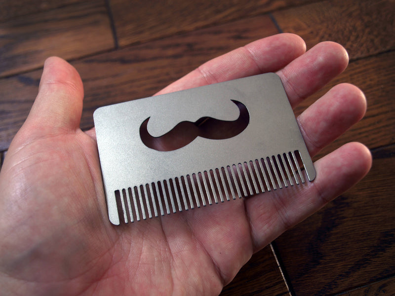 Load image into Gallery viewer, Titanium Mustache Comb from Calti, edc tool, tactical tool, edc, every day carry, titanium edc, tactical edc, beard comb, hipster comb
