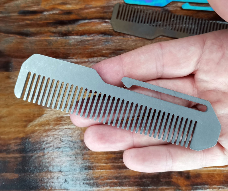 Load image into Gallery viewer, Titanium Comb from Calti with clip, edc tool, tactical tool, edc, every day carry, hair comd, titanium edc, tactical edc, punisher custom
