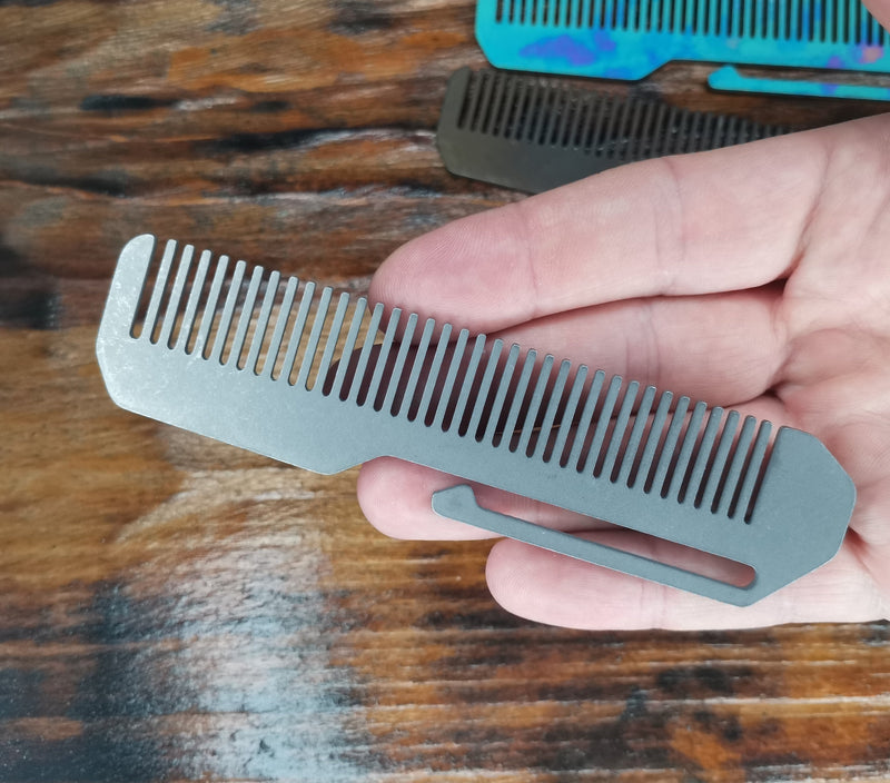 Load image into Gallery viewer, Titanium Comb from Calti with clip, edc tool, tactical tool, edc, every day carry, hair comd, titanium edc, tactical edc, punisher custom
